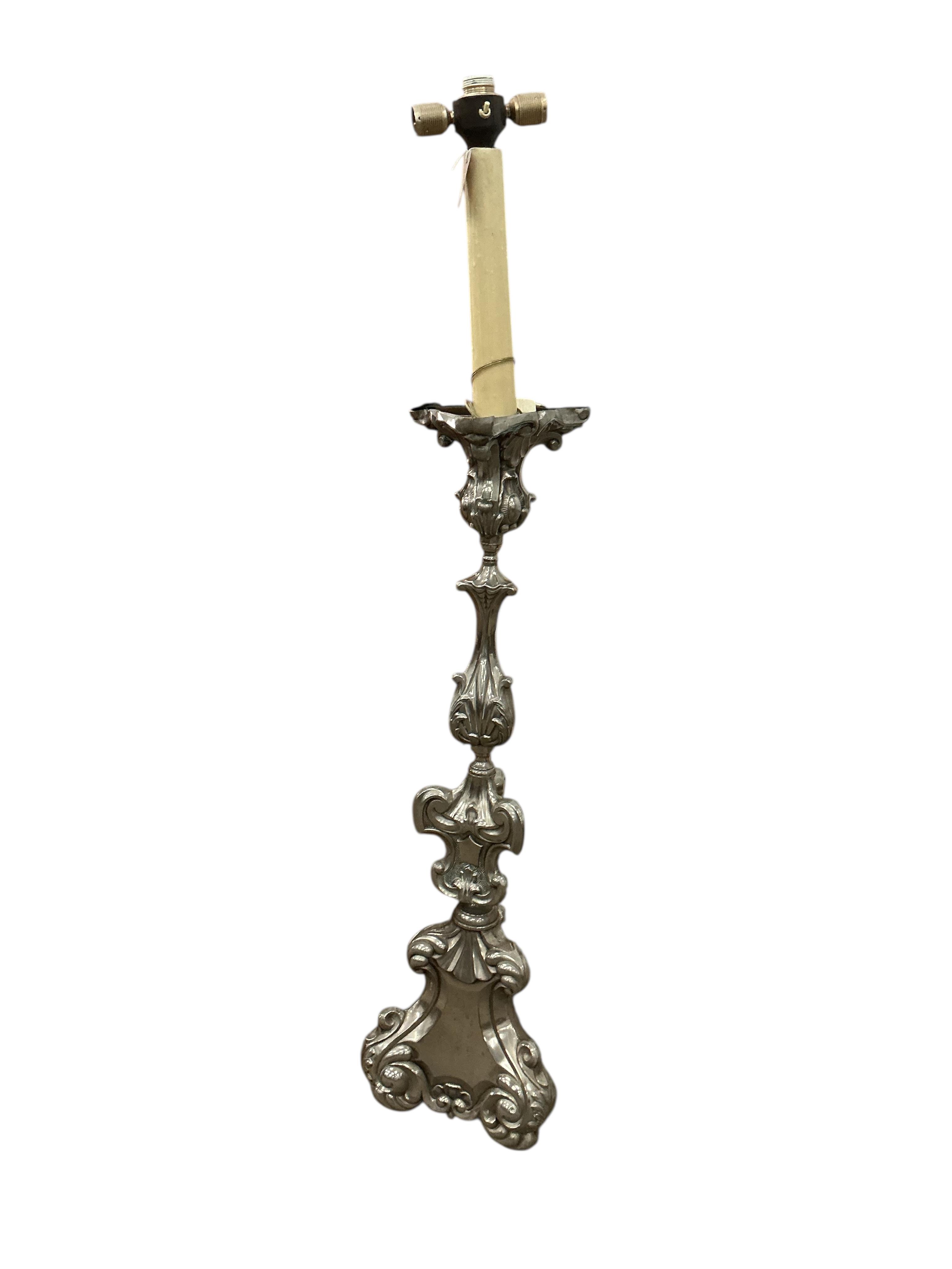 An 18th century style embossed metal standard lamp, height 156cm